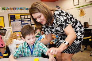 Teacher and child in Texas classroom