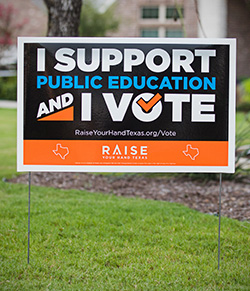 I support public education and i vote posted on grassy lawn