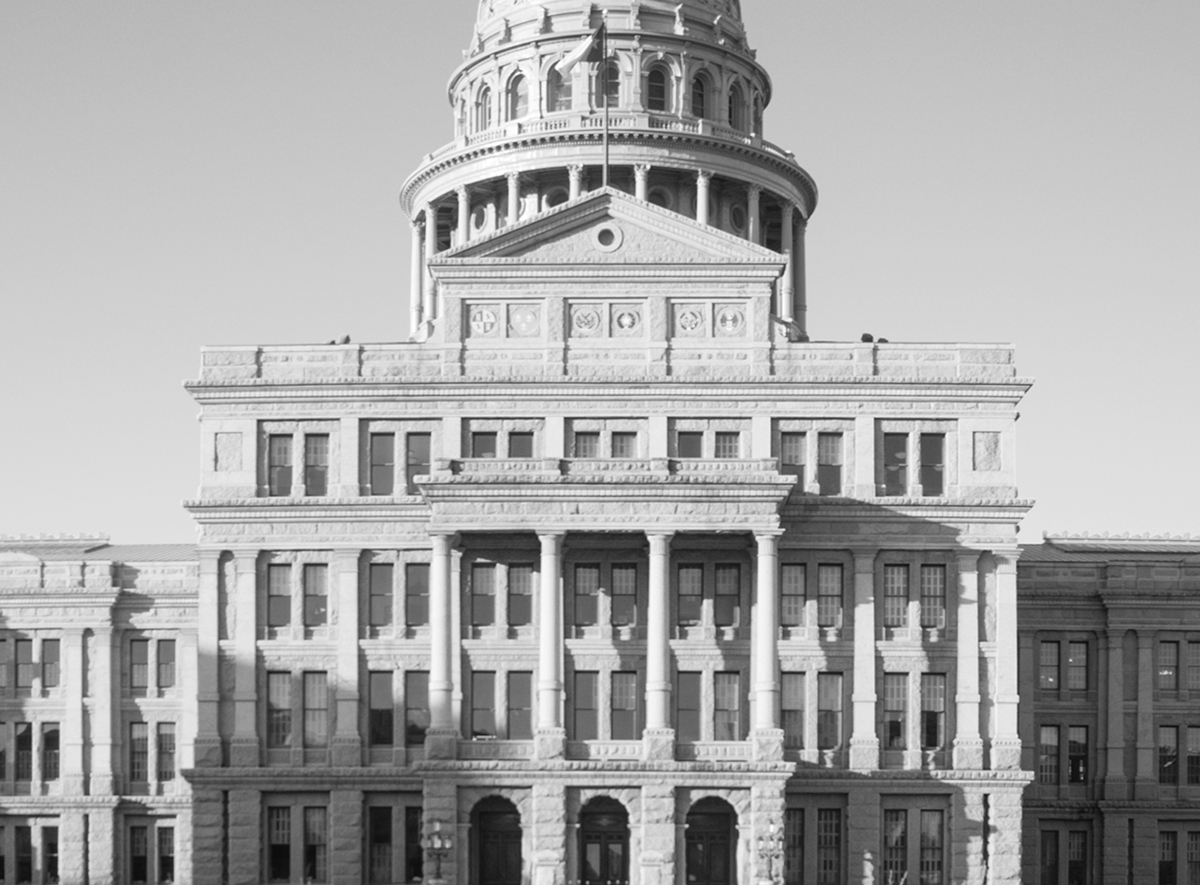 Grey image of the Capitol of Texas