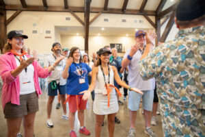 Education advocates participate in team building exercises at Moon Shadow Haven just outside of Kerrville.